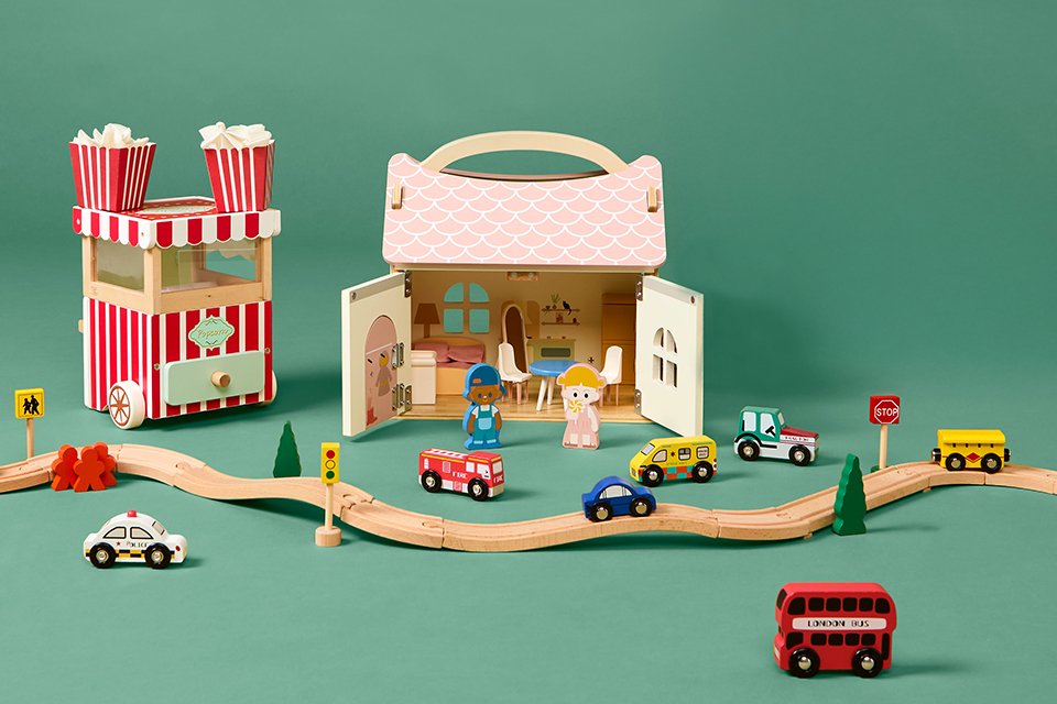 The full range collection of Chad Valley's wooden toys are displayed.